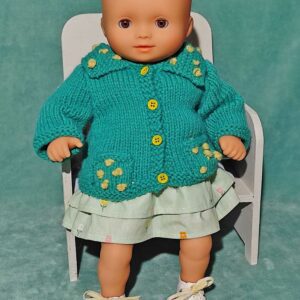 jupe à volants et gilet à tricoter sur poupon baby pomea