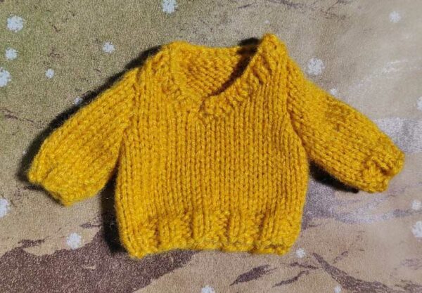 Pull col V Mini corolline