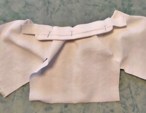 Biais d'encolure veste de poupée