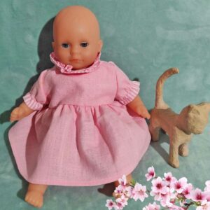 Robe be lin rose sur le poupon Corolle 30 cm